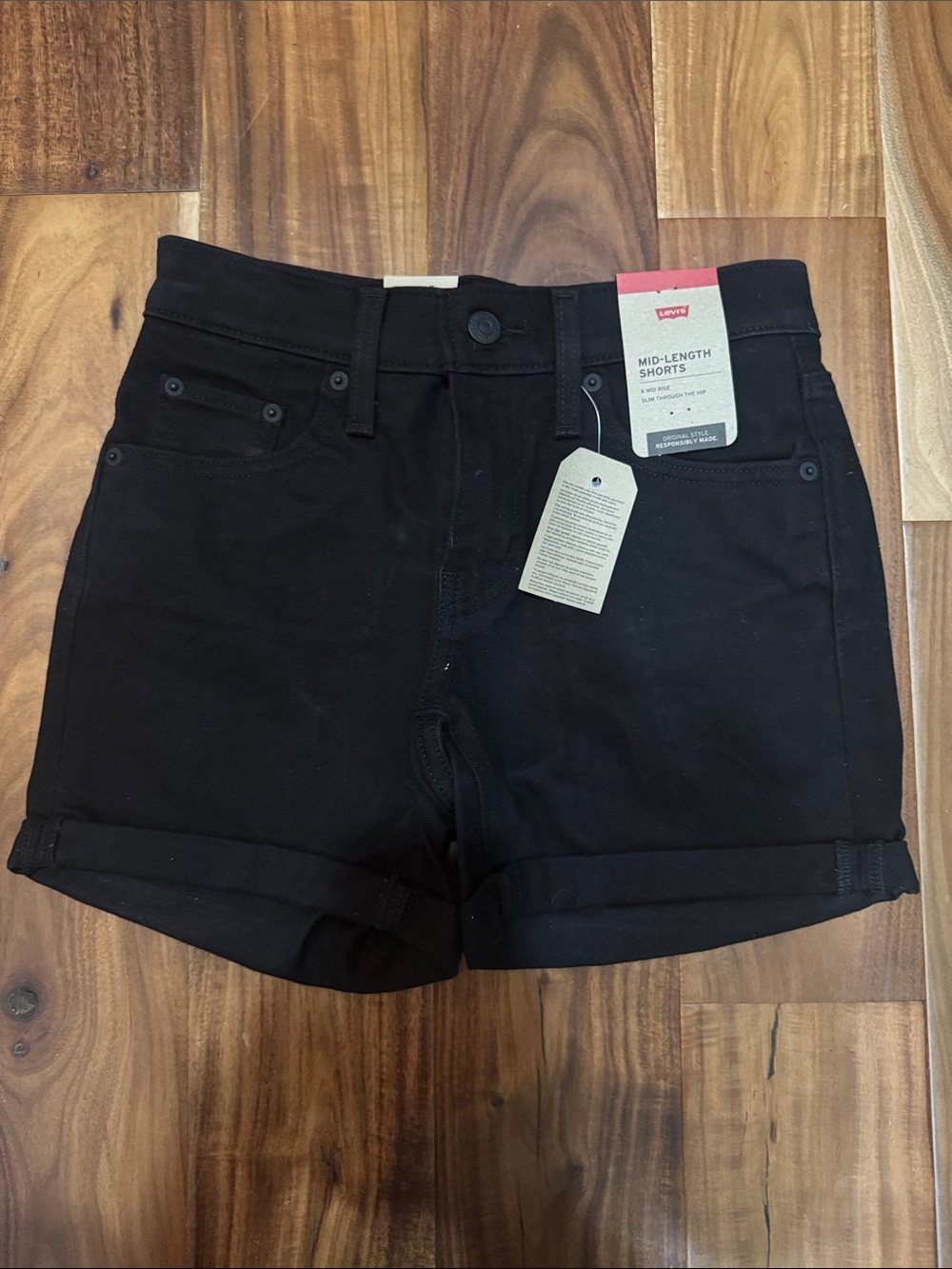 Levi's Women's Black Mid-Length Rolled Hem Jean Shorts